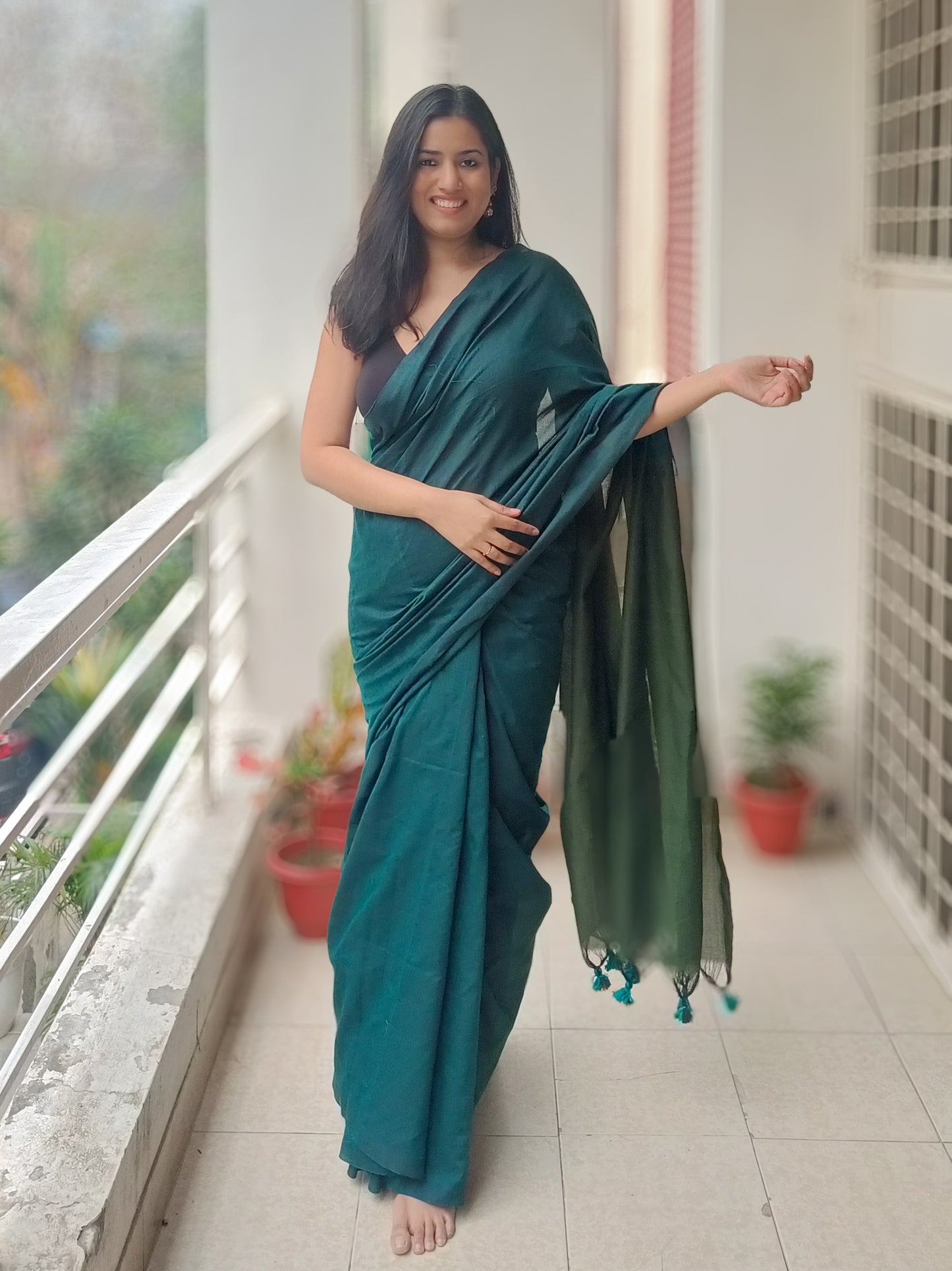 Elegant teal green handloom khadi cotton saree with a tassel-finished pallu, a stylish choice for office wear and everyday elegance – Phulwari Bazaar| Phulwari Bazar