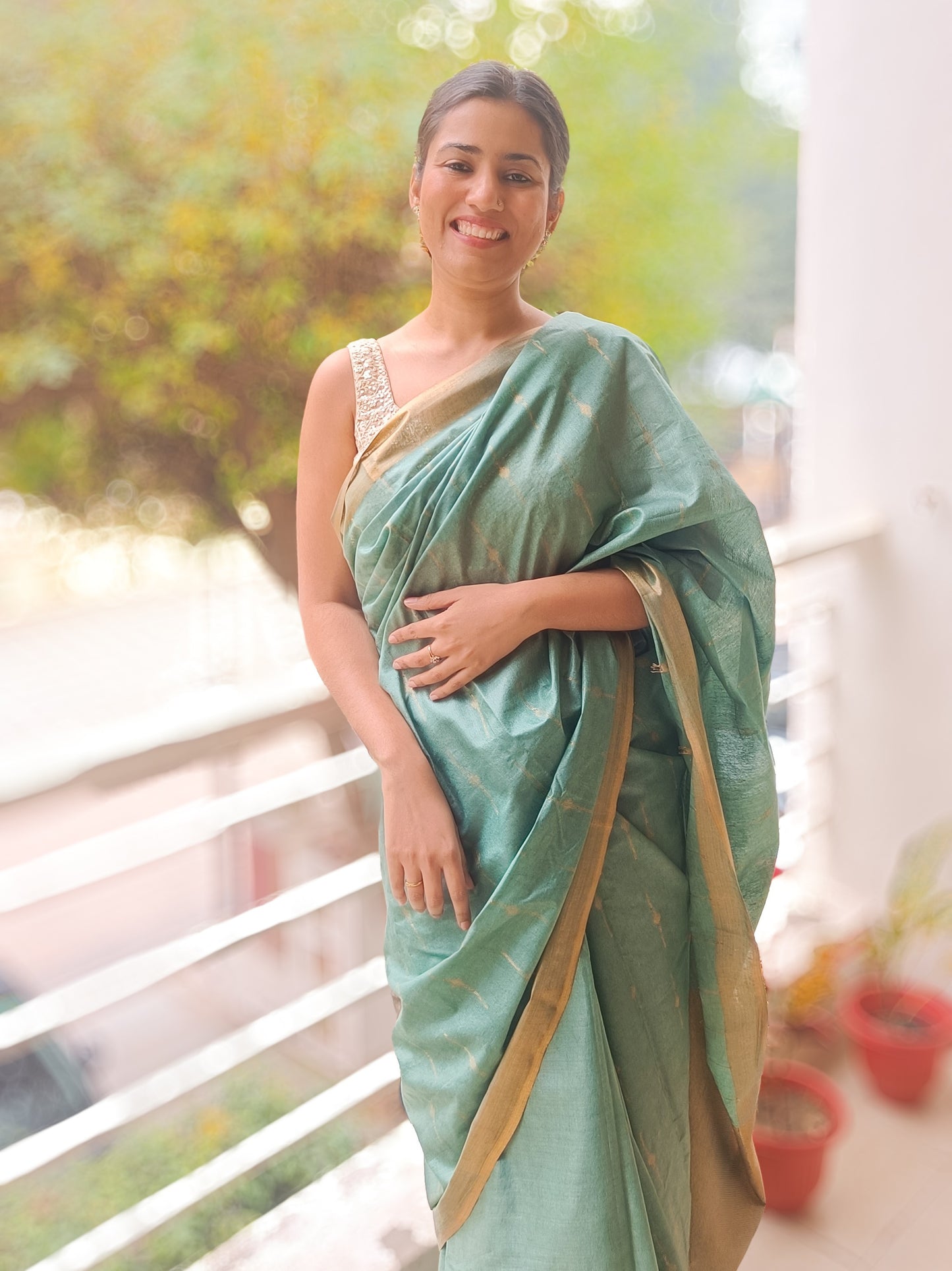 Chanderi silk Wild Willow saree with gold zari buti work, green color, tassels, Phulwari Bazaar