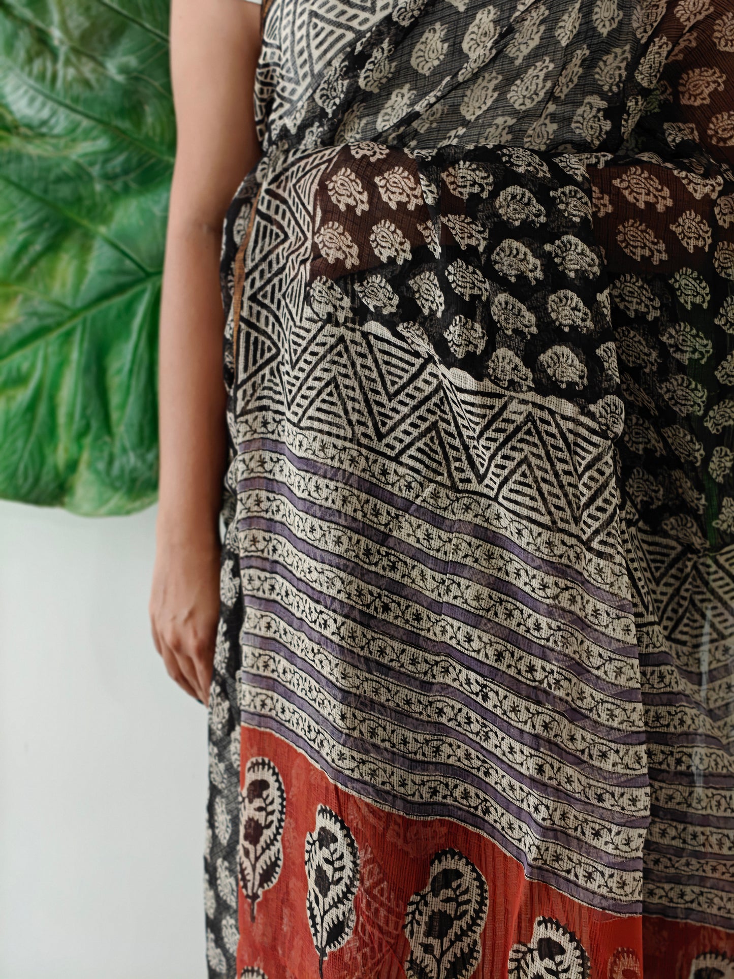 Maati| Black & Earthy Red Handblocked Kota Doria Saree