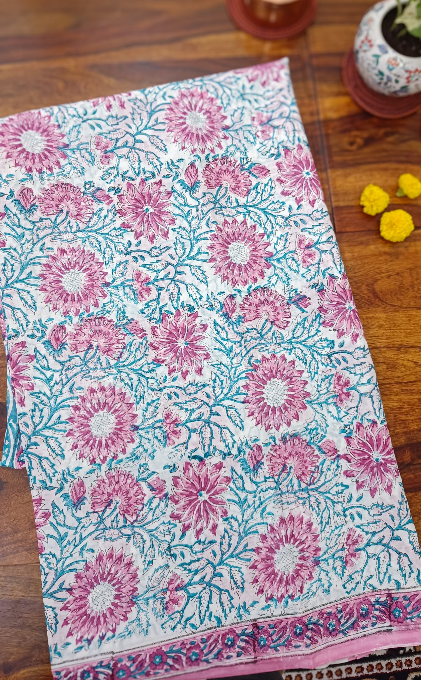 Elegant floral-printed Mulmul saree with soft fabric, ideal for brunches, garden parties, and celebrations, Phulwari Bazaar