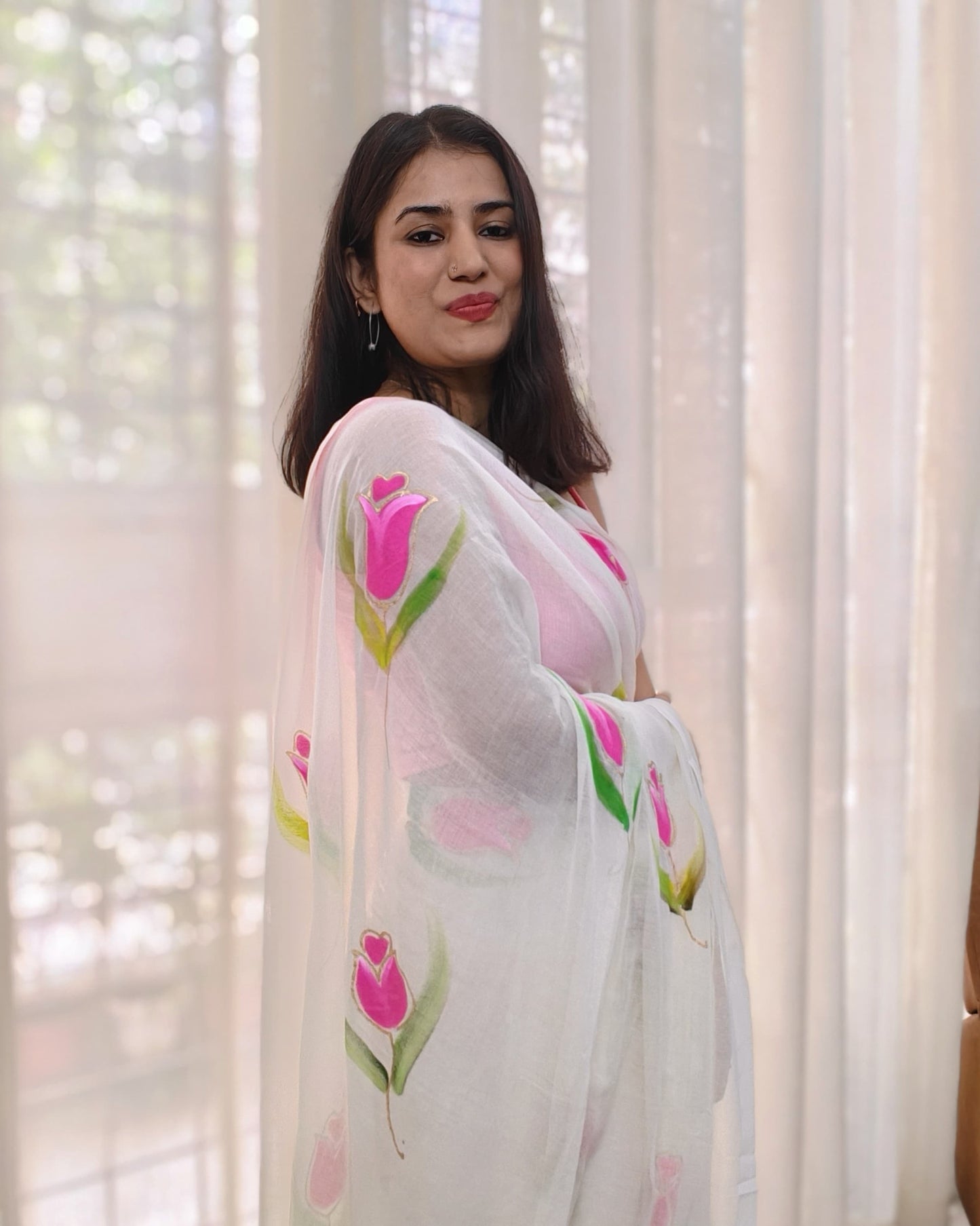 Phulwari Bazaar white saree – plain breathable mulmul cotton saree with handpainted pink florals, handcrafted Bengal summer saree.