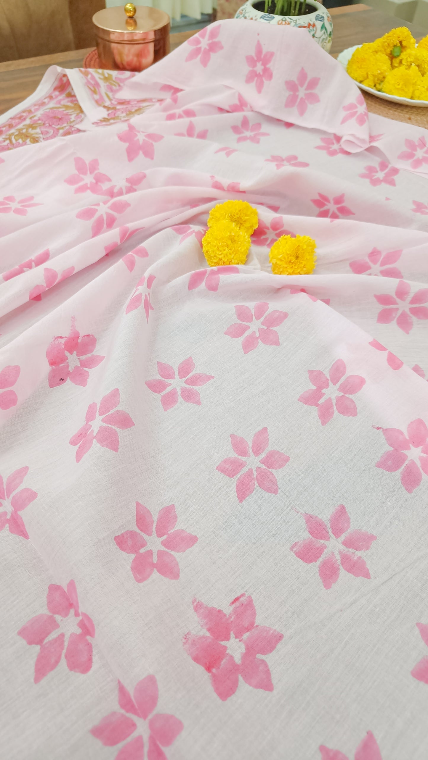 Elegant floral-printed saree with a matching blouse piece, ideal for casual and festive occasions