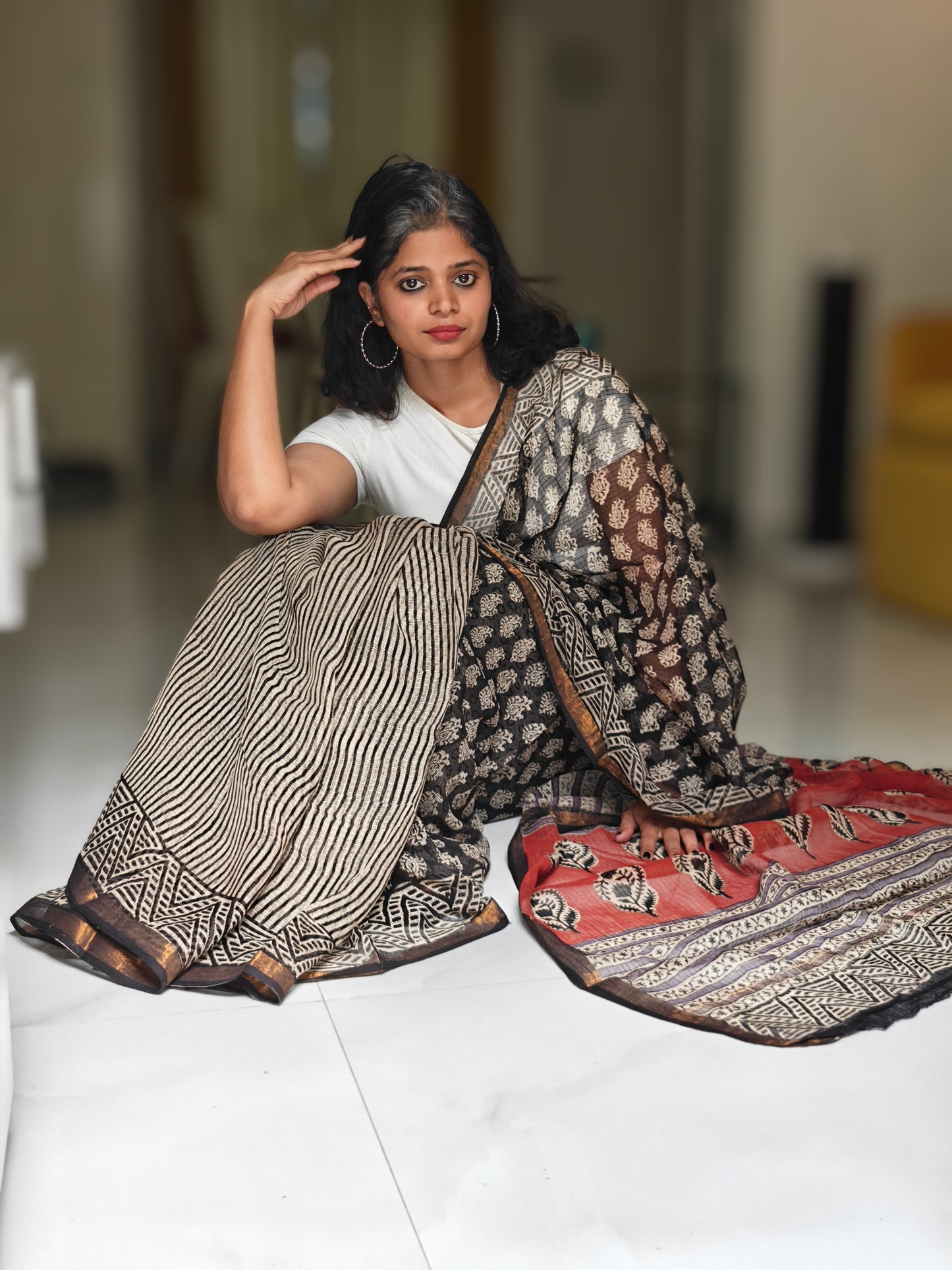 Maati| Black & Earthy Red Handblocked Kota Doria Saree