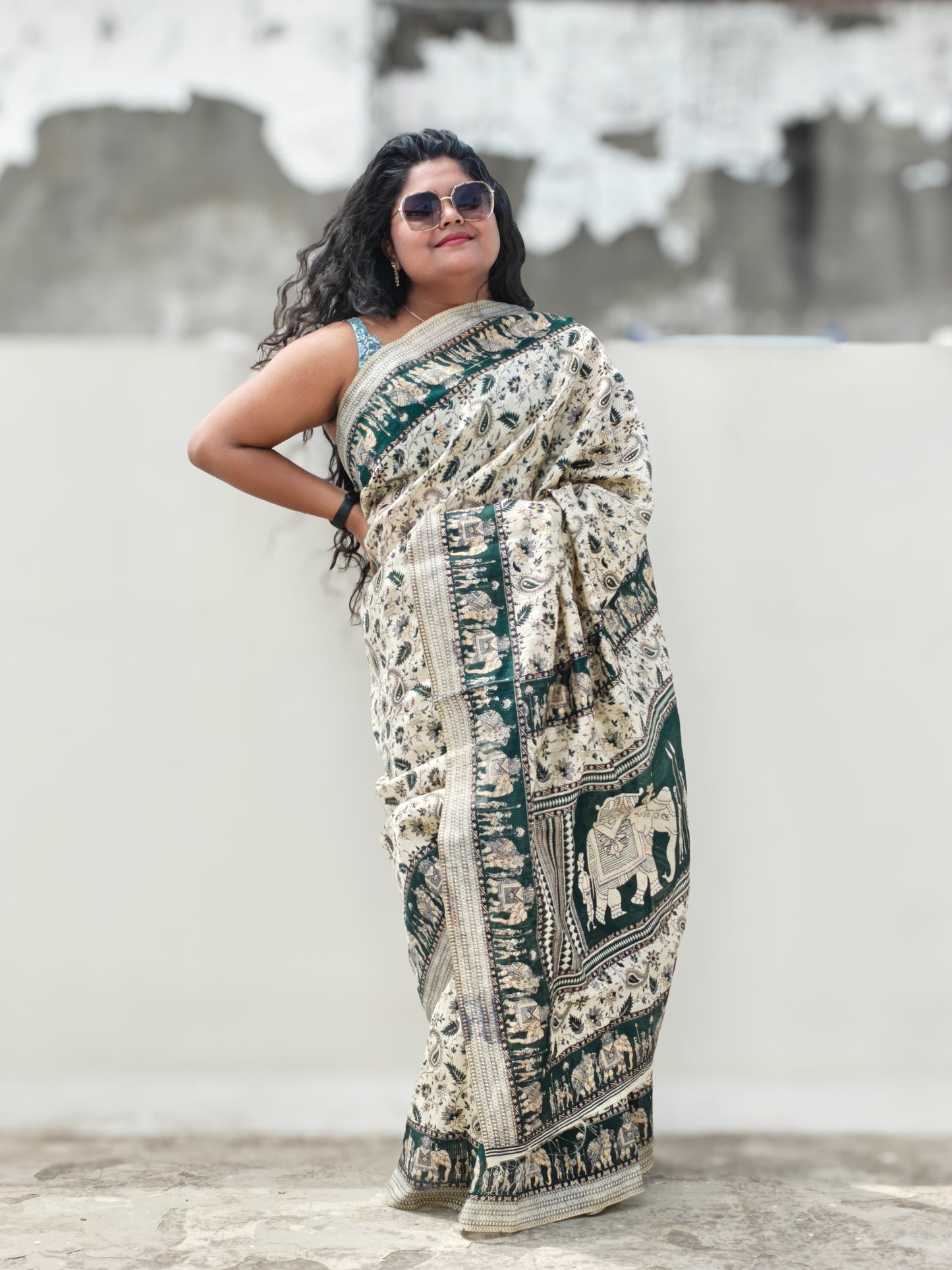 Handloom Tarini saree with hand-block prints from Rajasthan, featuring green hues and a regal elephant border | Phulwari Bazaar