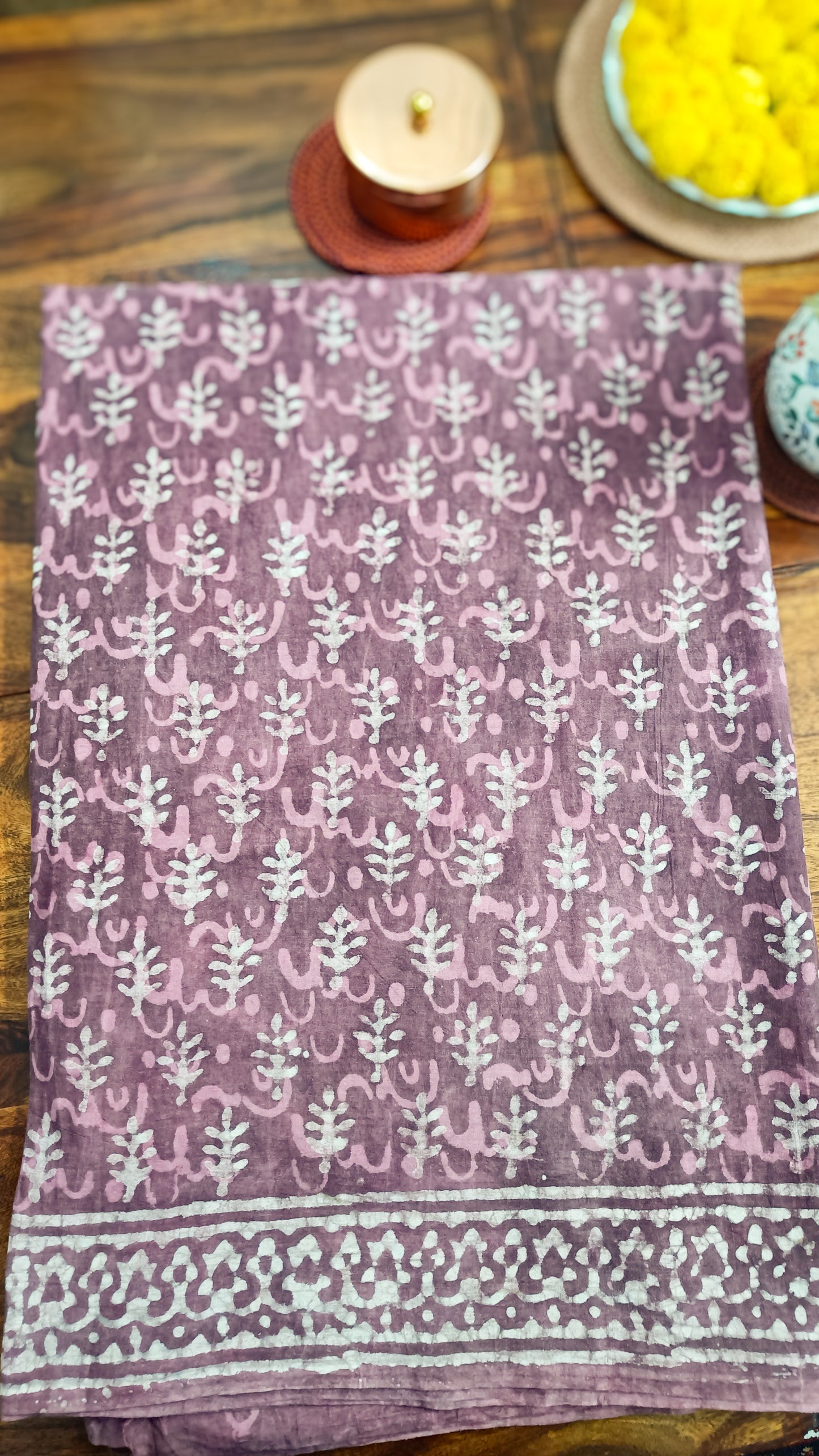 Soft Mulmul cotton fabric of Rosewood Dreams saree with intricate handprinted Sangneri design, available at Phulwari Bazaar.