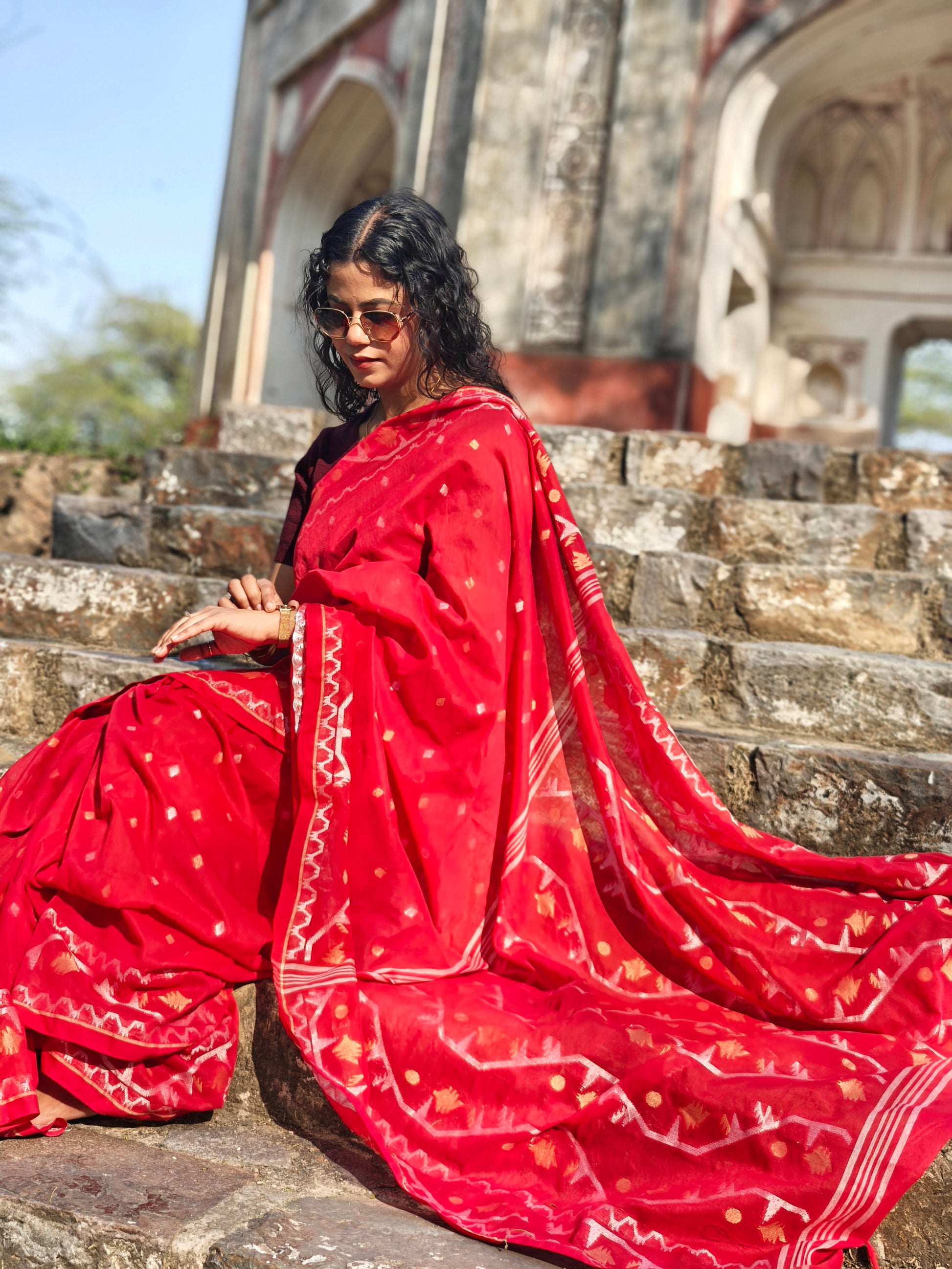 Bengal handwoven Jamdani saree in red with gold zari detailing. Phulwari Bazaar| Phulwari Bazar