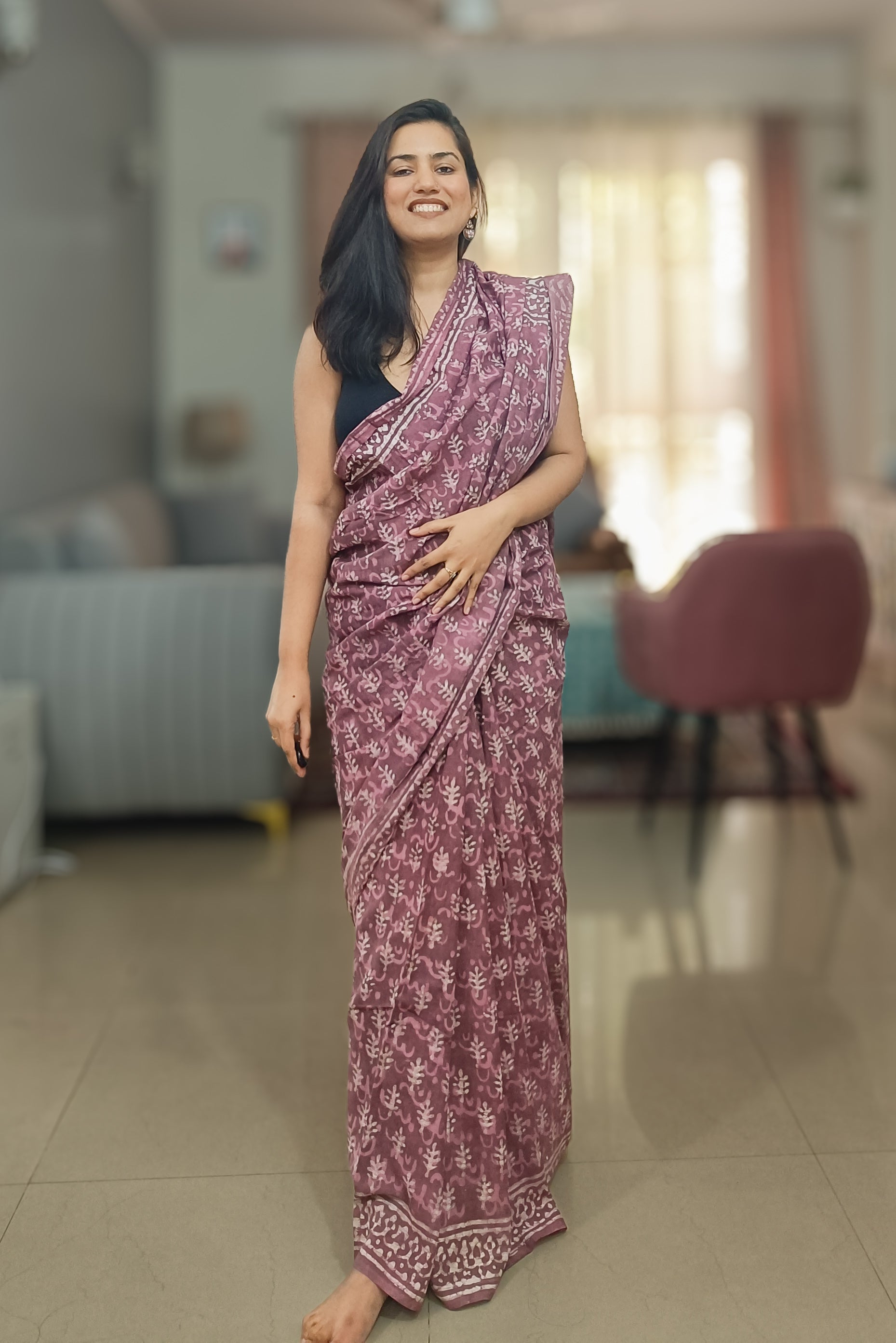 Rosewood Dreams handprinted Sangneri pattern saree draped elegantly in Mulmul cotton, available at Phulwari Bazaar.