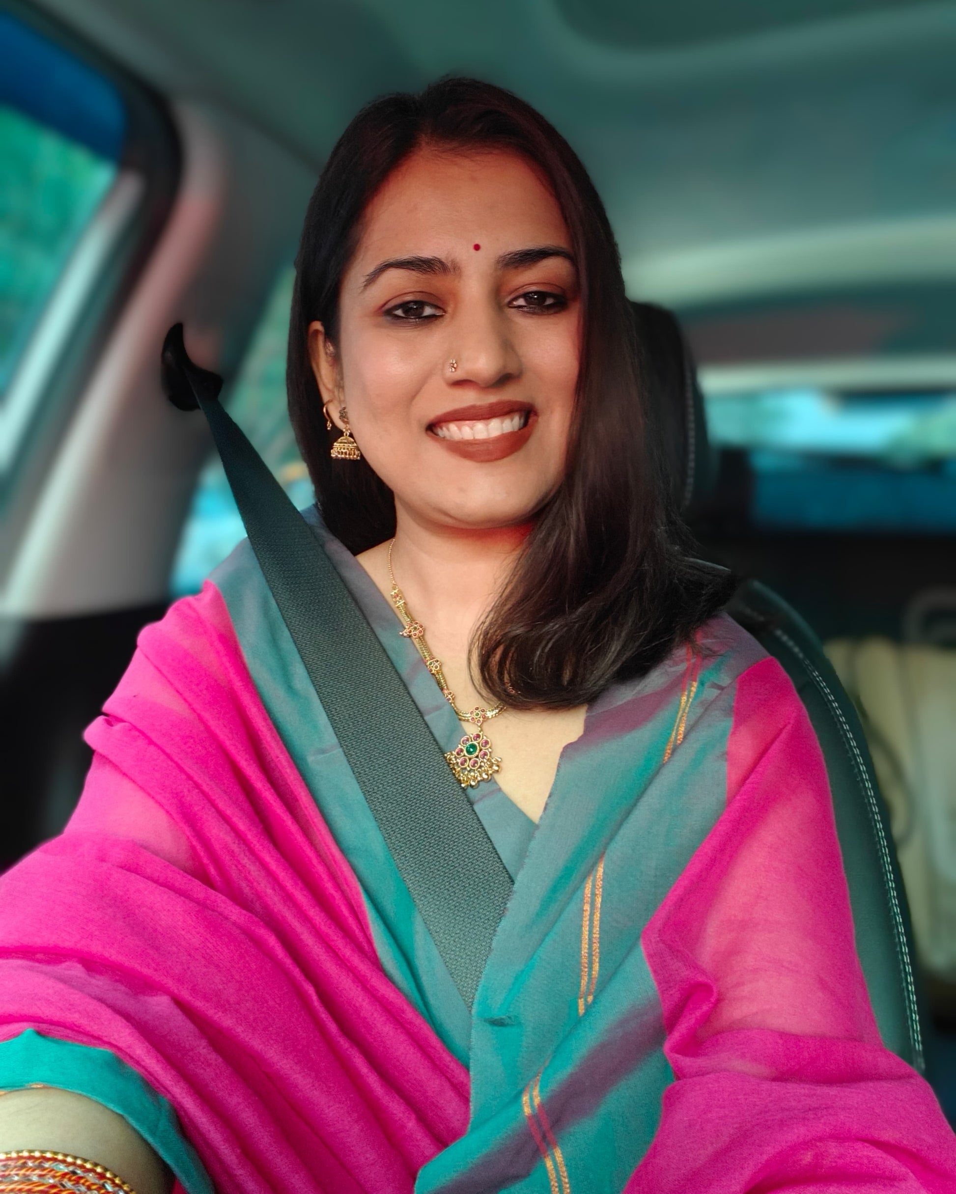 Matching playful tassels on Mala rani pink mulmul cotton saree from Phulwari Bazaar