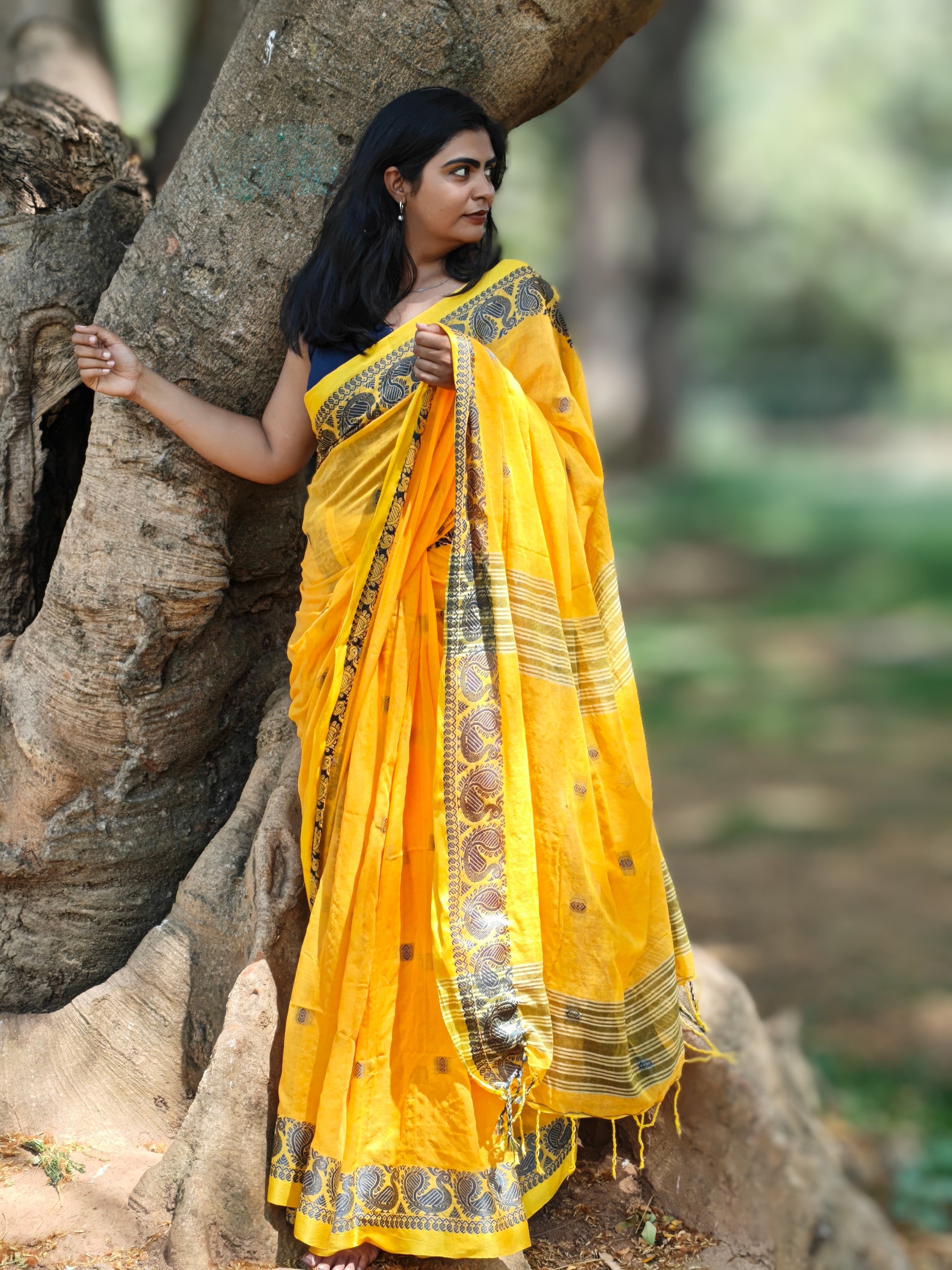 Handcrafted Bengali cotton saree in soft yellow color