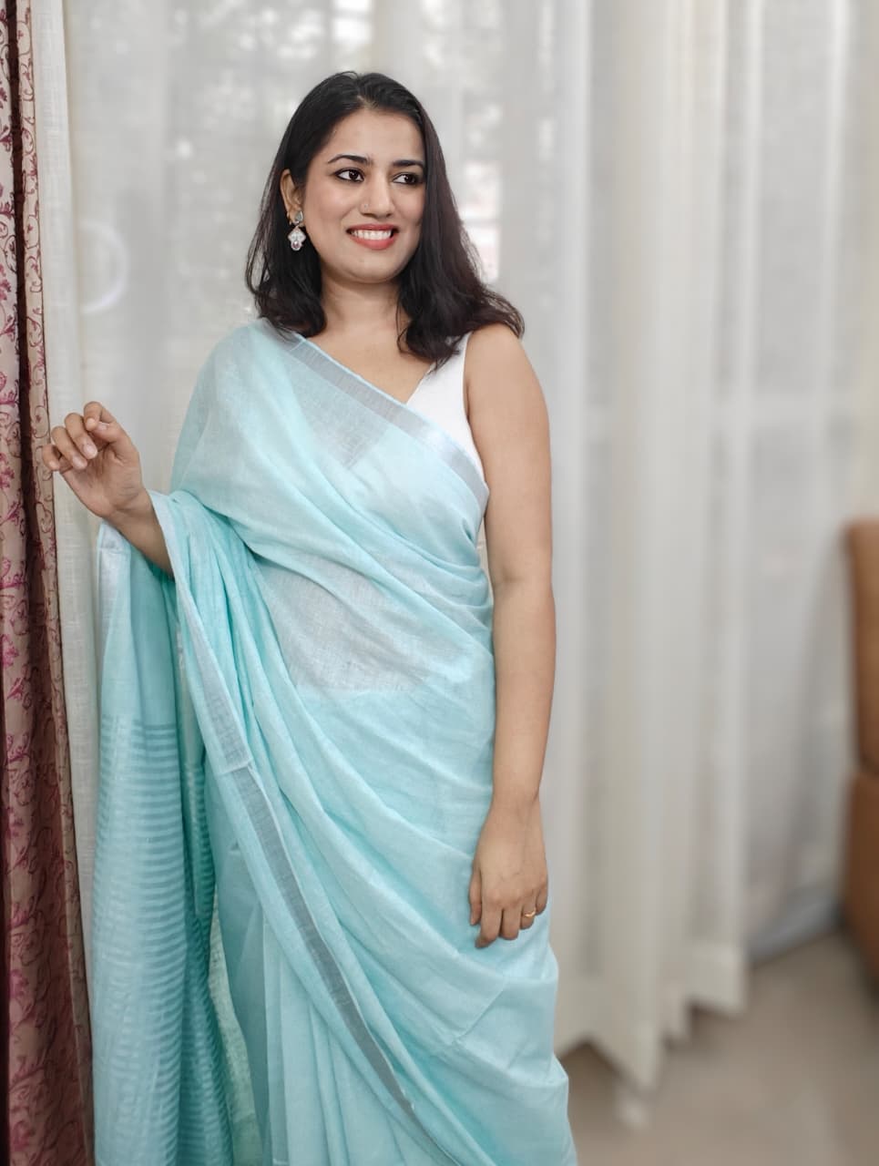 Sagarika| Aqua Blue & Silver Handloom Linen Saree