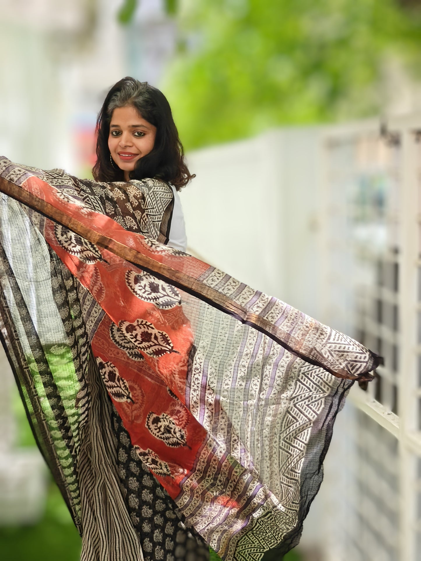 Maati| Black & Earthy Red Handblocked Kota Doria Saree