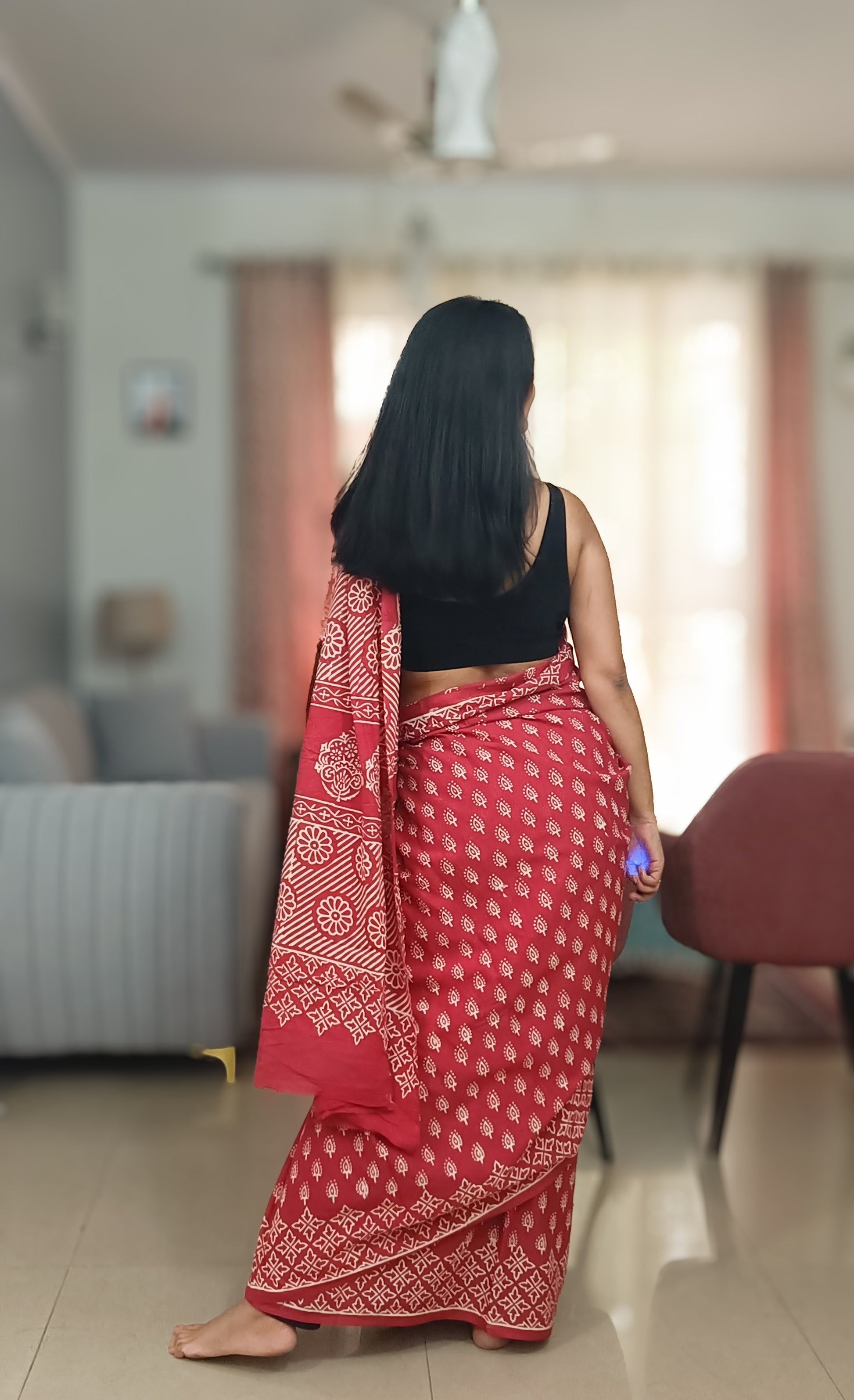 Dusky Rose saree draped elegantly, showcasing the delicate handprinted pattern and soft cotton fabric, available at Phulwari Bazaar