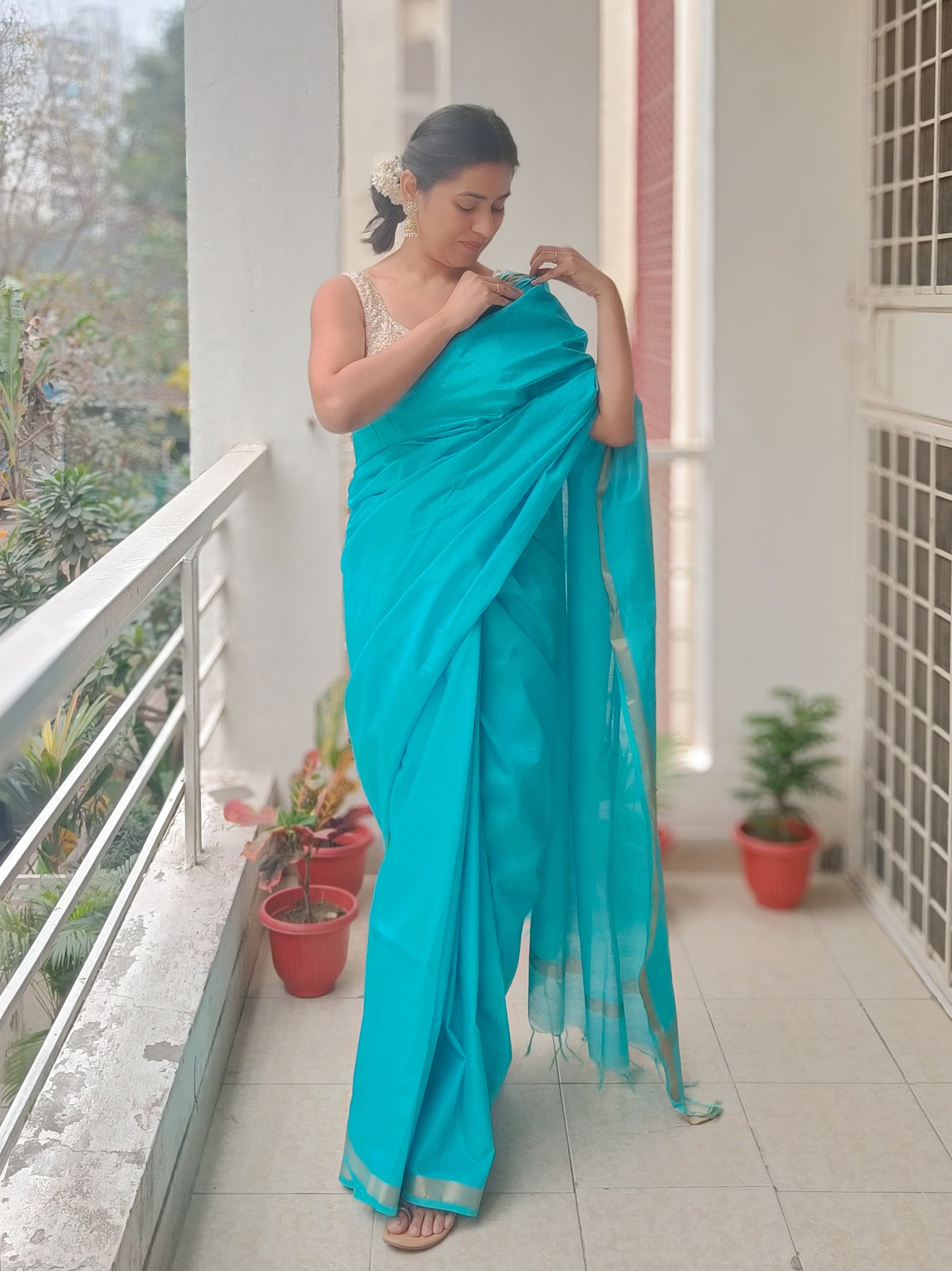 Chanderi cotton silk Turquoise Temptation saree with gold zari detailing on pallu and border, vibrant turquoise blue saree, ideal for formal and festive occasions - Phulwari Bazaar.