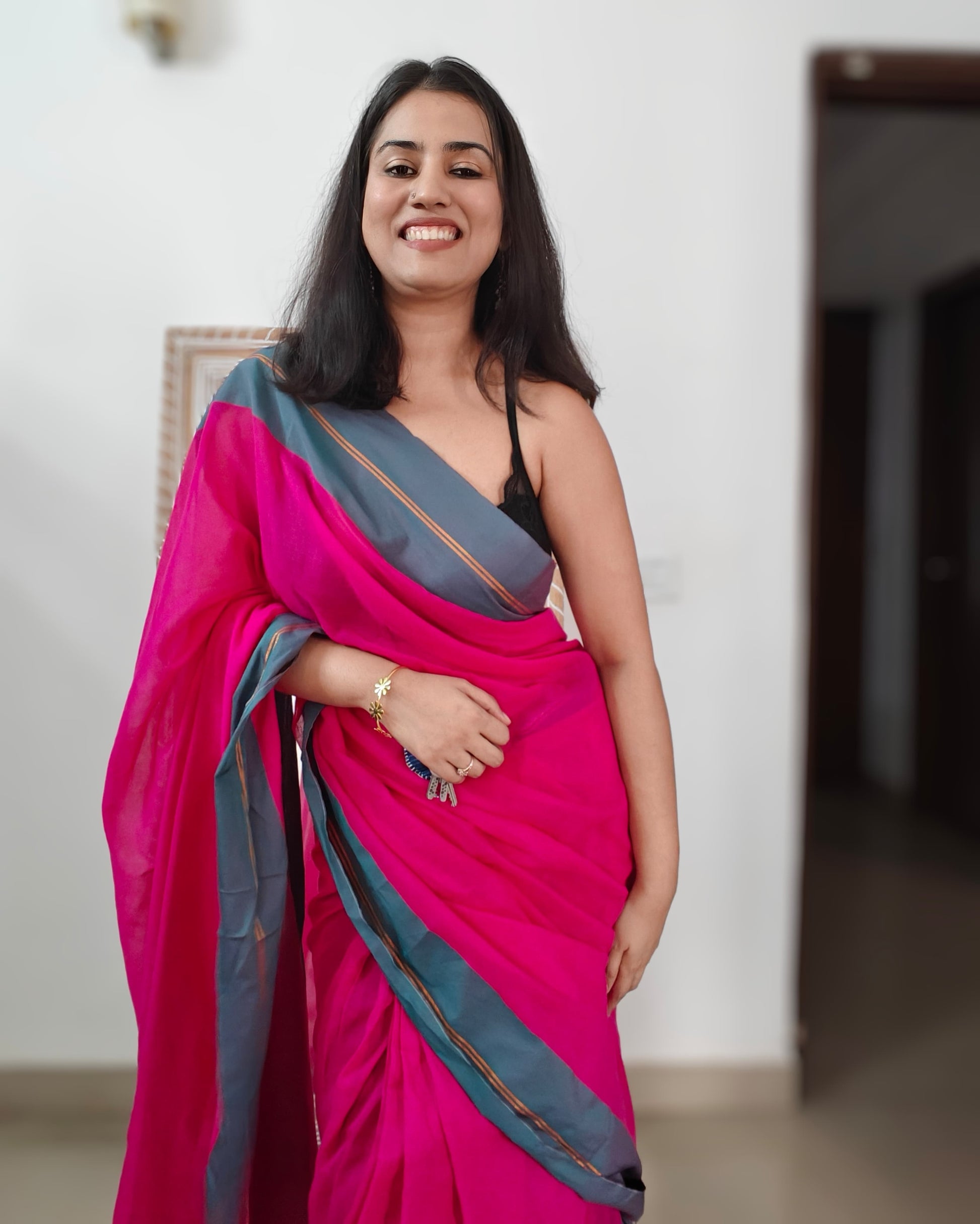 Deep grey-green border with zari stripe detail on Mala mulmul cotton saree from Phulwari Bazaar