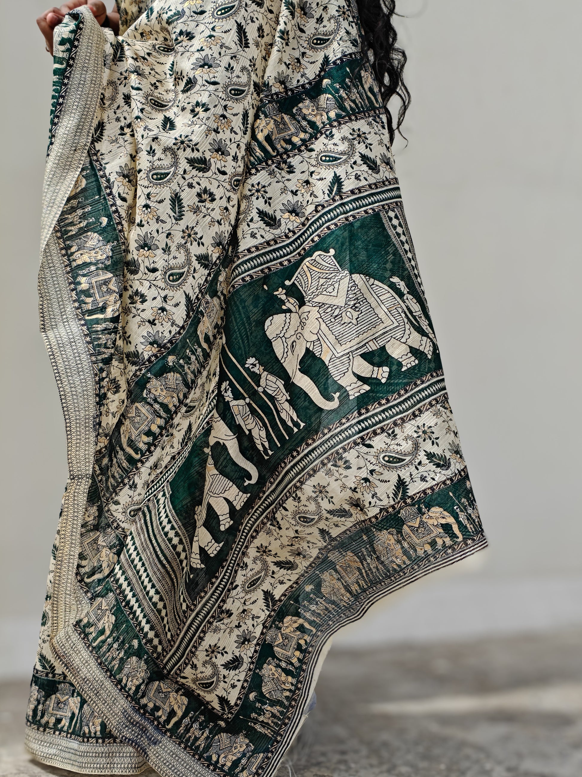 Handloom Tarini saree showcasing its soothing white and green hues with elephant border and bamboo silk texture| Phulwari Bazaar| White Saree