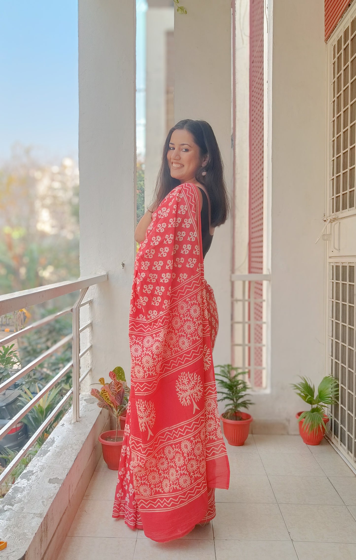 Tangerine Spark saree pallu with intricate handprinted Sangneri patterns on soft Mulmul cotton,  Phulwari Bazaar