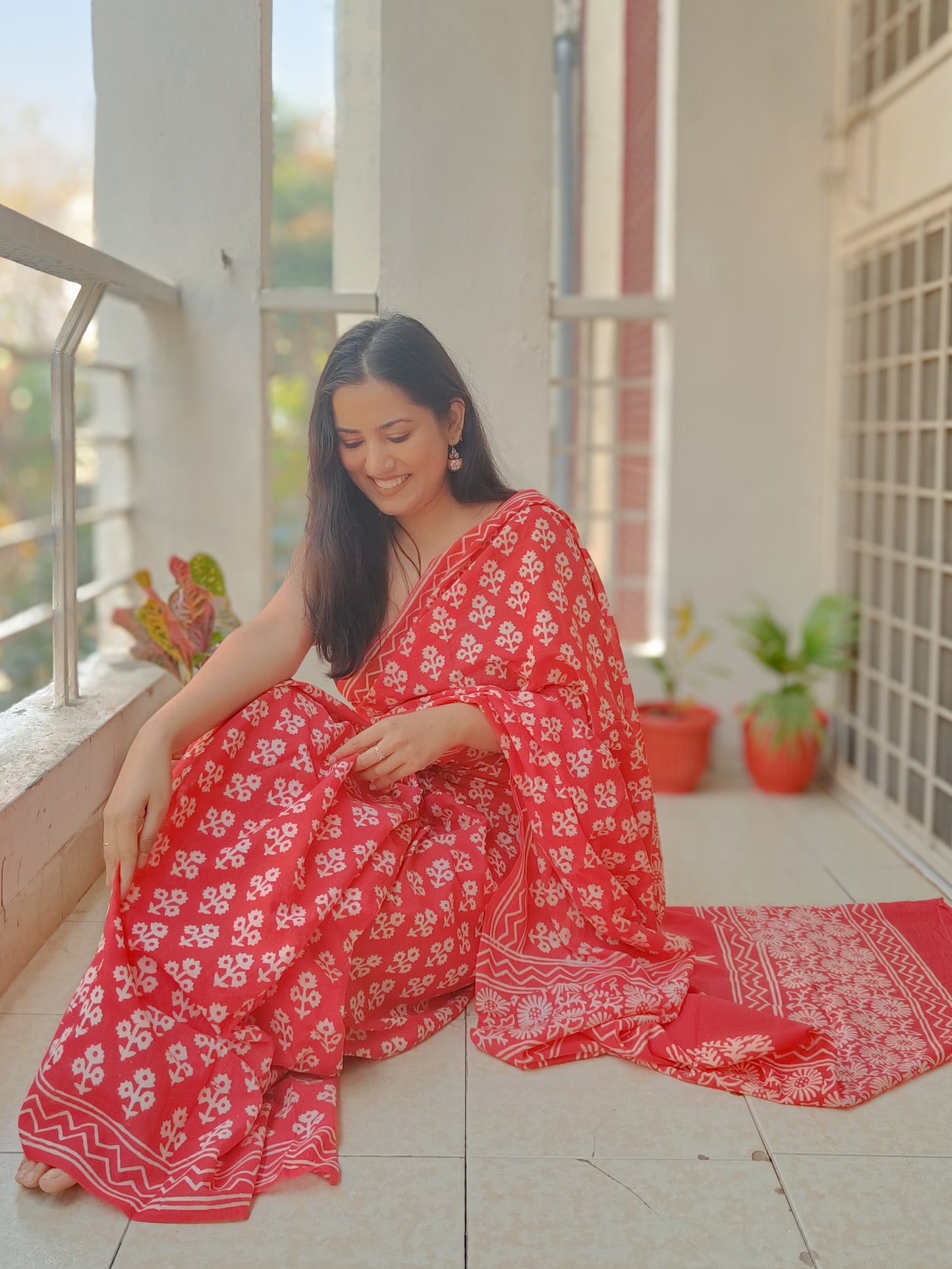 Handprinted Sangneri Mulmul cotton saree in vibrant tangerine with intricate patterns, Phulwari Bazaar