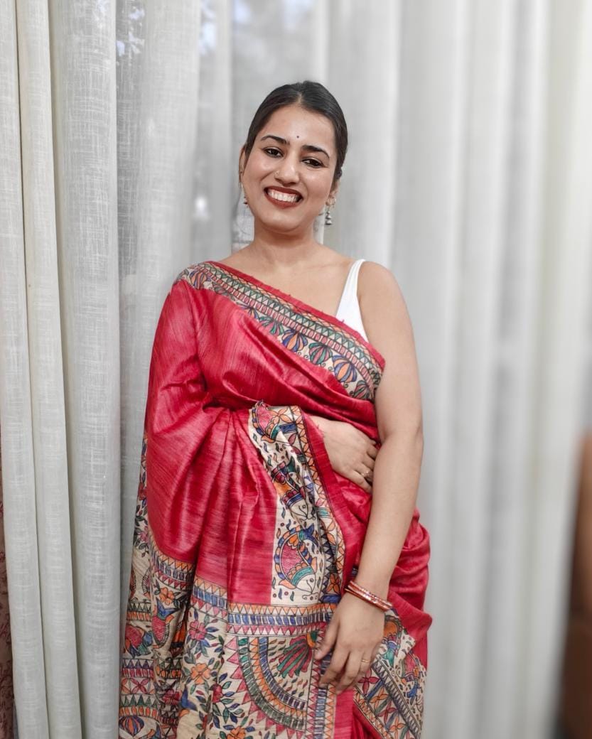 Madhu hand-painted Madhubani tussar ghicha silk saree with red base and intricate border and pallu artwork, sustainable ahimsa silk from Phulwari Bazaar